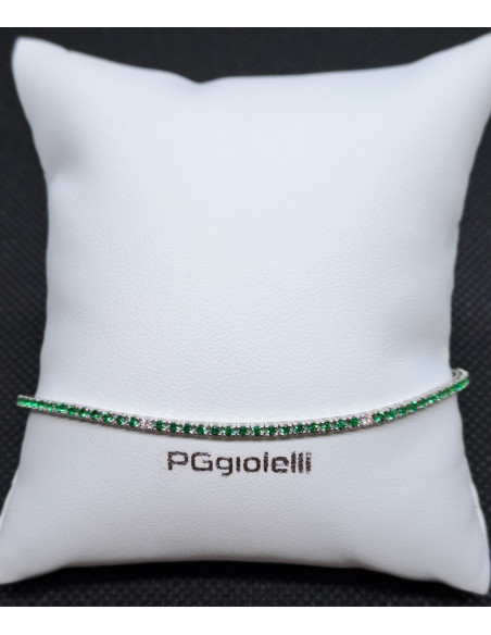 Bracciale tennis in oro bianco 750 con smeraldi e diamanti
