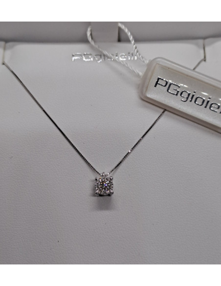 Punto luce donna oro bianco 750 e diamanti ,con orecchini abbinati